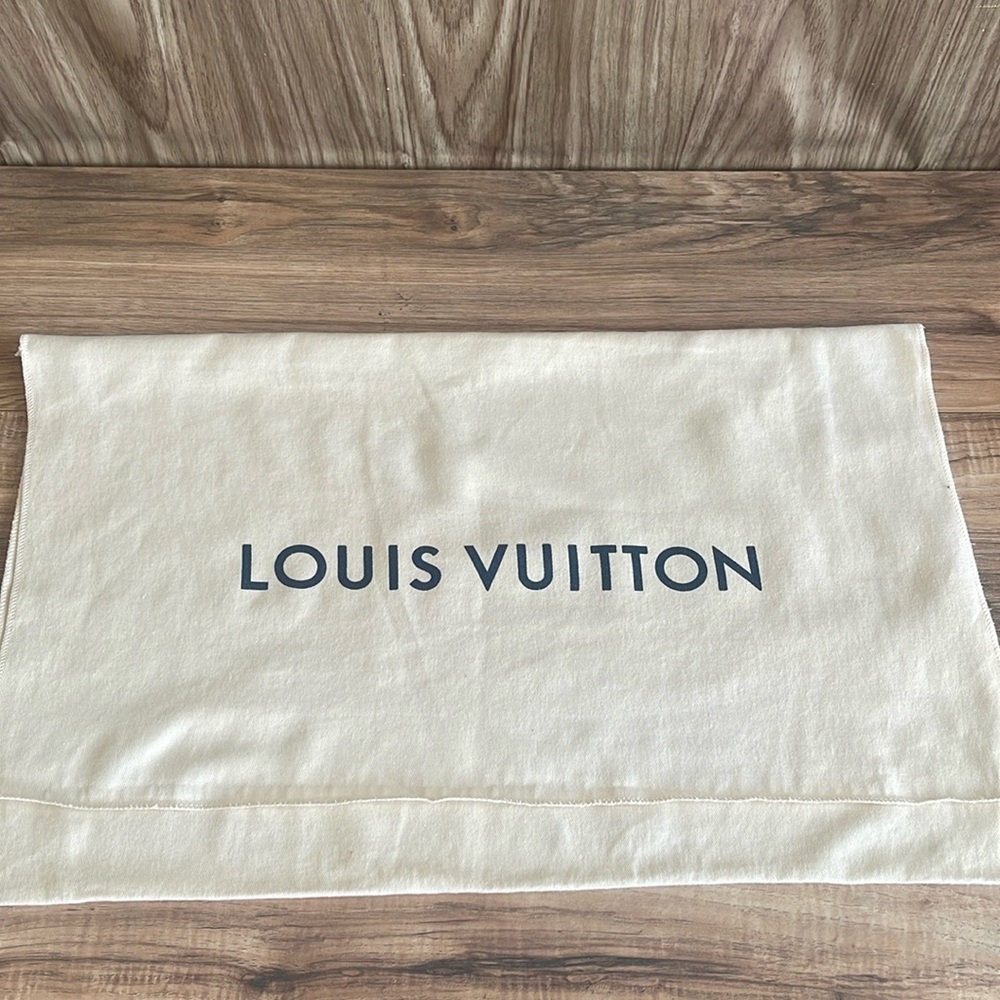 Louis Vuitton Dust Bag in Cream with Navy Logo has a small stain